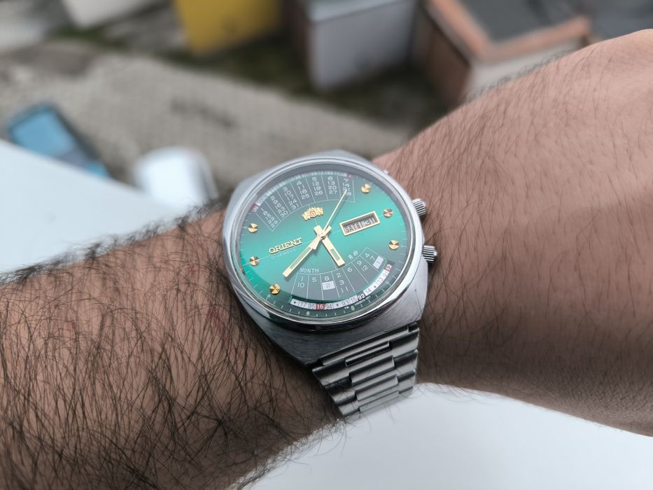 STAN NOWY zegarek orient zieleń cesarski patelnia królewski multi year