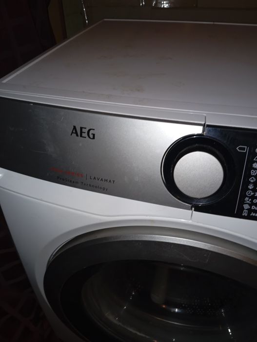 Продам стиральную машину премиум класса AEG L7FEE48S на 8 кг