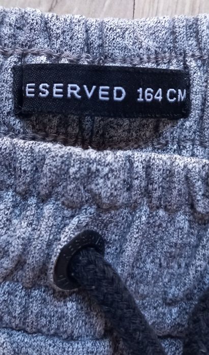 Spodnie dresowe chłopięce 164 reserved