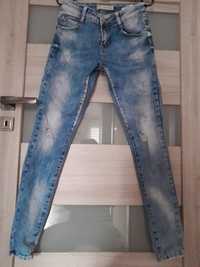 Spodnie damskie jeansowe z przetarciami wygodne