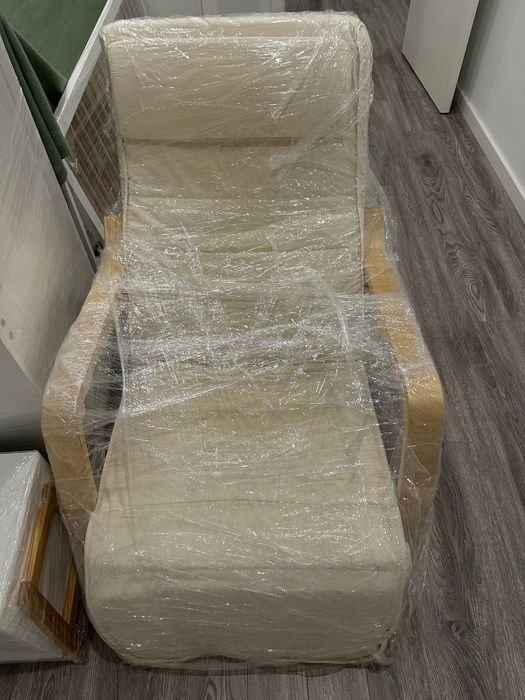 Cadeira de balanço com apoio para os pés