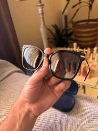 Óculos Tommy Hilfiger pretos de sol de mulher