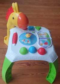 Interaktywny stolik ŻYRAFA firmy FISHER PRICE.