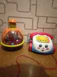Дзиґа Battat  і телефон каталка Fisher price