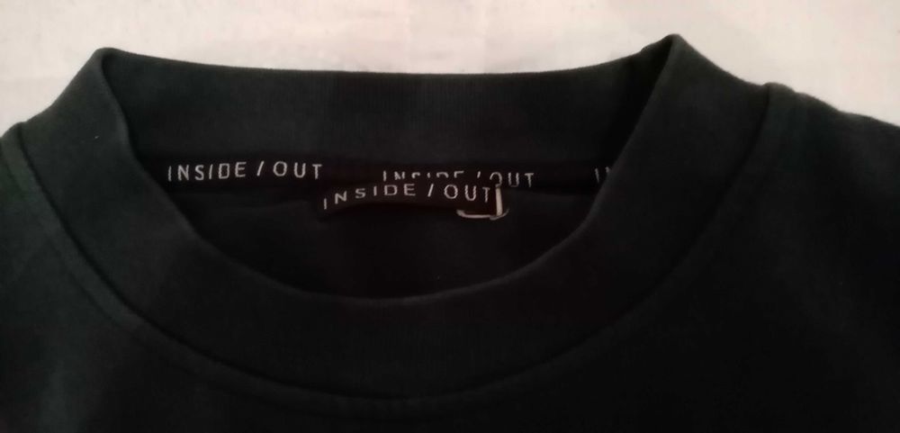 Camisola verde com interior em plástico