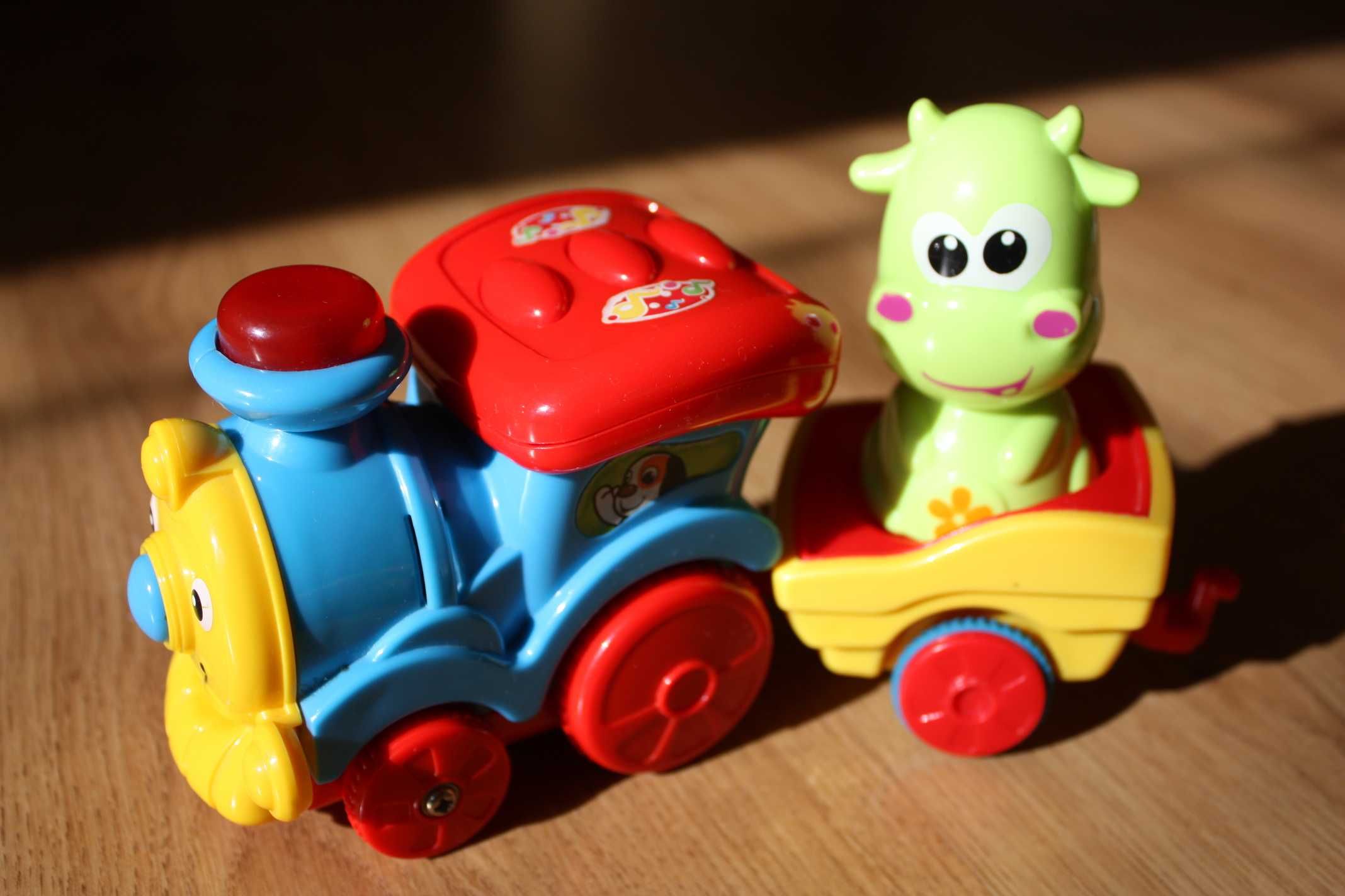 Grające zabawki dla maluszka - zestaw lokomotywa i paninko Smiki