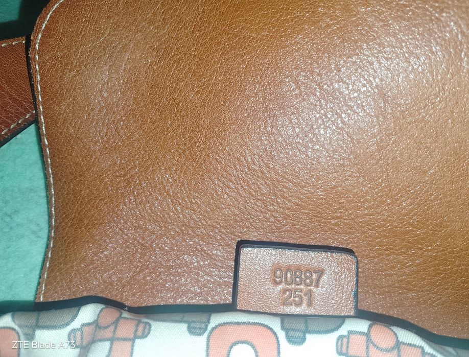 Сумочка Гуччи  в отличном  состоянии.,колекцыоная ,инклюзив.