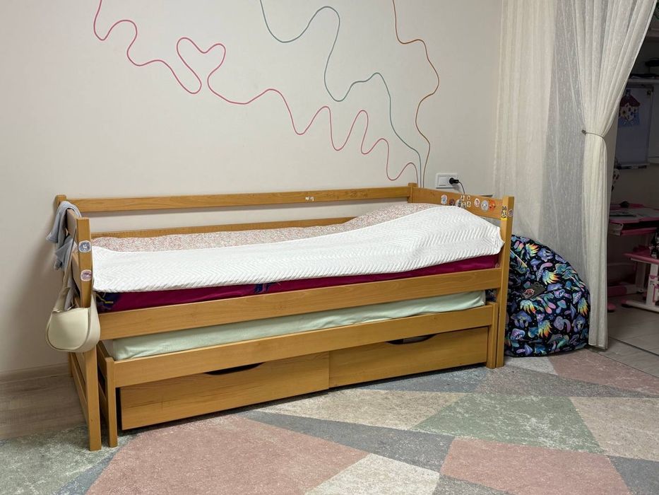 Ліжко з двома спальними місцями