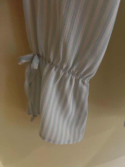 Blusa com folho de manga comprida