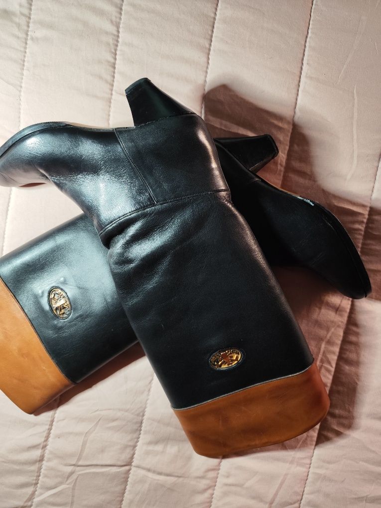 Botas de pele novas