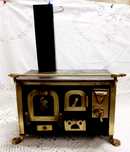 Miniatura de Fogão a lenha. (Brinquedo).