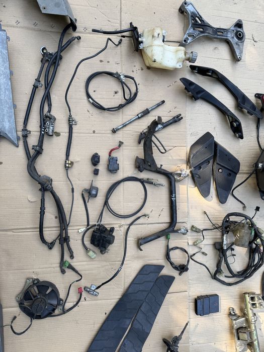 Honda Pantheon 150 owiewka lampa czujnik kiwak instalacja uchwyt wąż