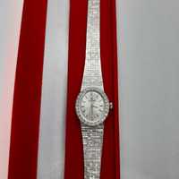 Omega w białym złocie 18k z diamentami