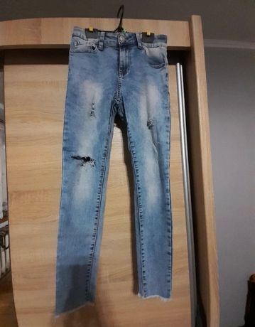 Jeans z przetarciami