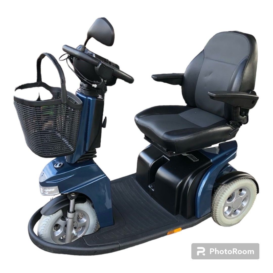 Інвалідна електрична коляска
