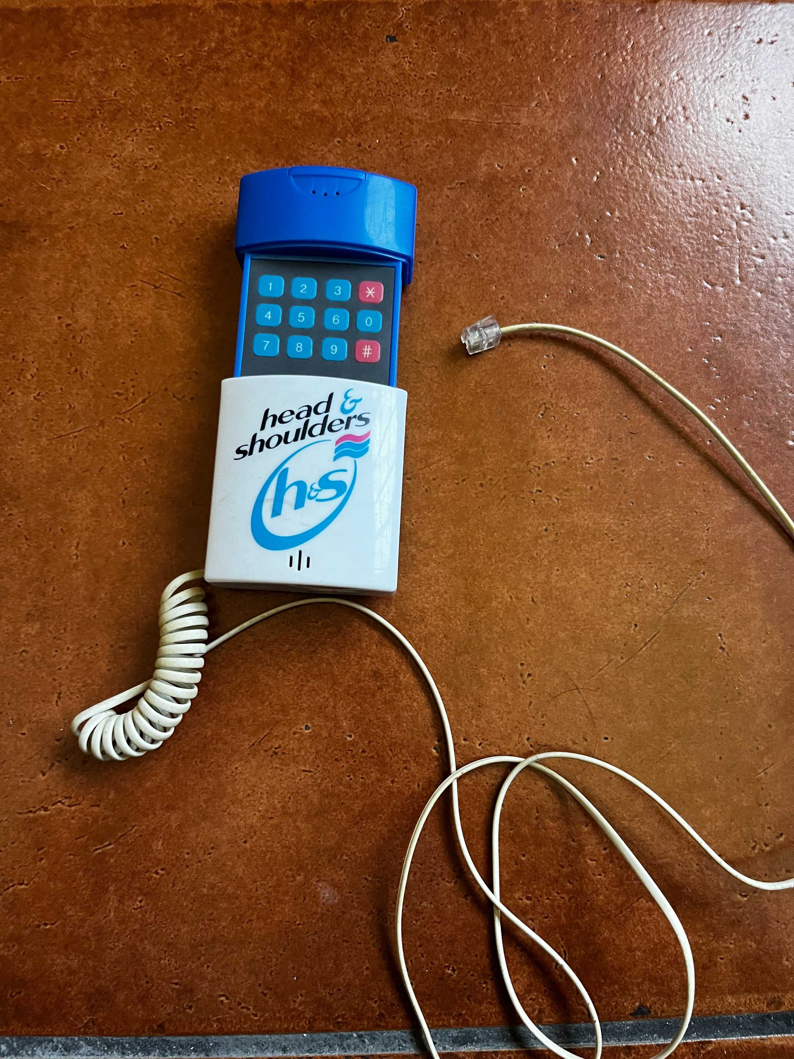 Telefone antigo formato champo