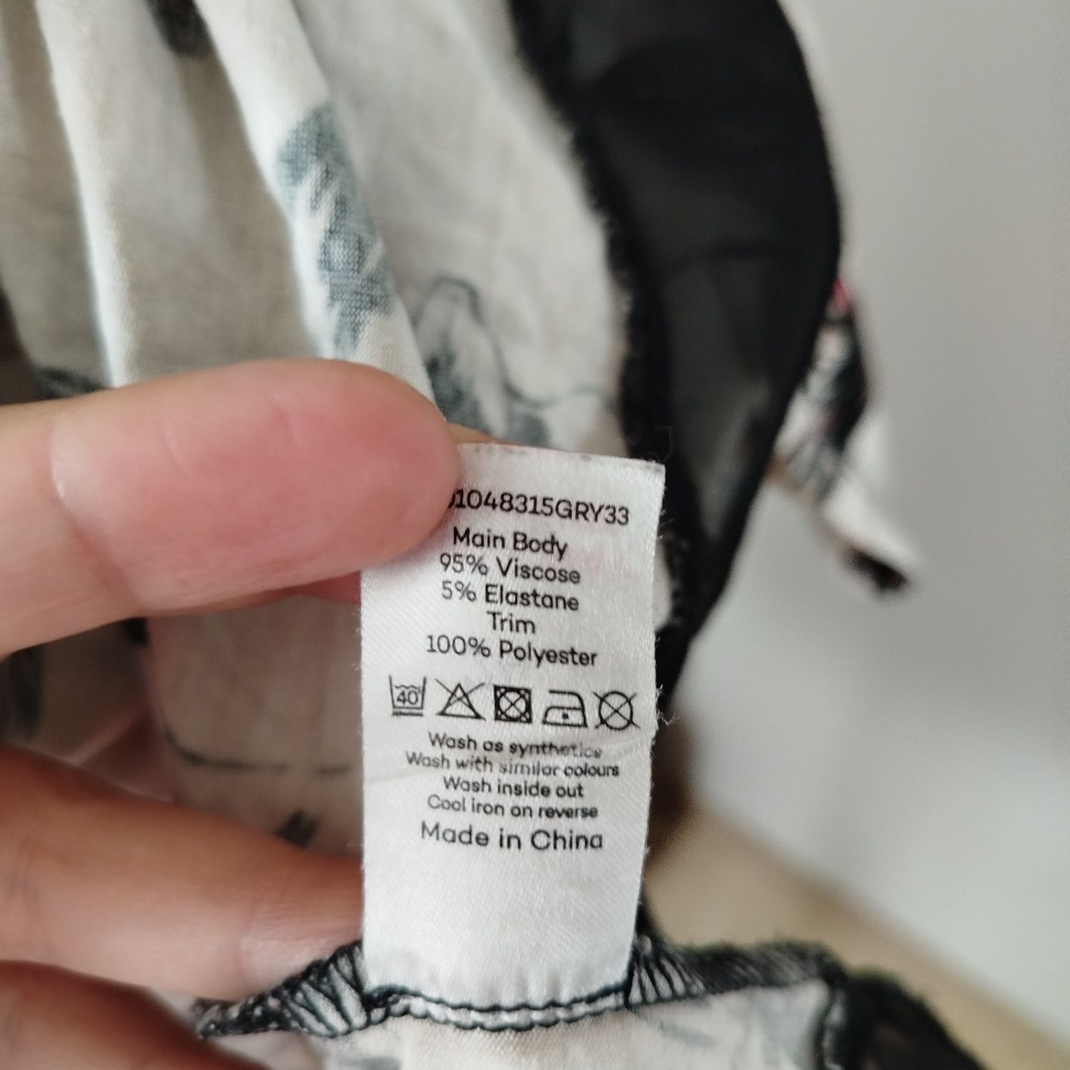 Asymetryczna tunika rogi plus size