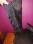 Botas de cano alto e salto cunha