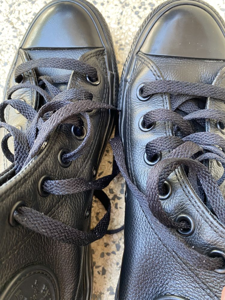 Sapatilha AllStar Converse preta em Couro