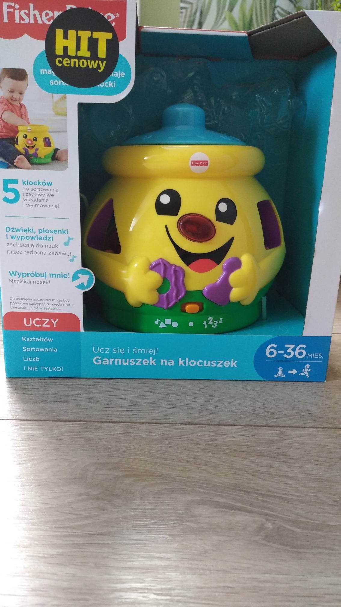 Fisher-Price Garnuszek na klocuszek.