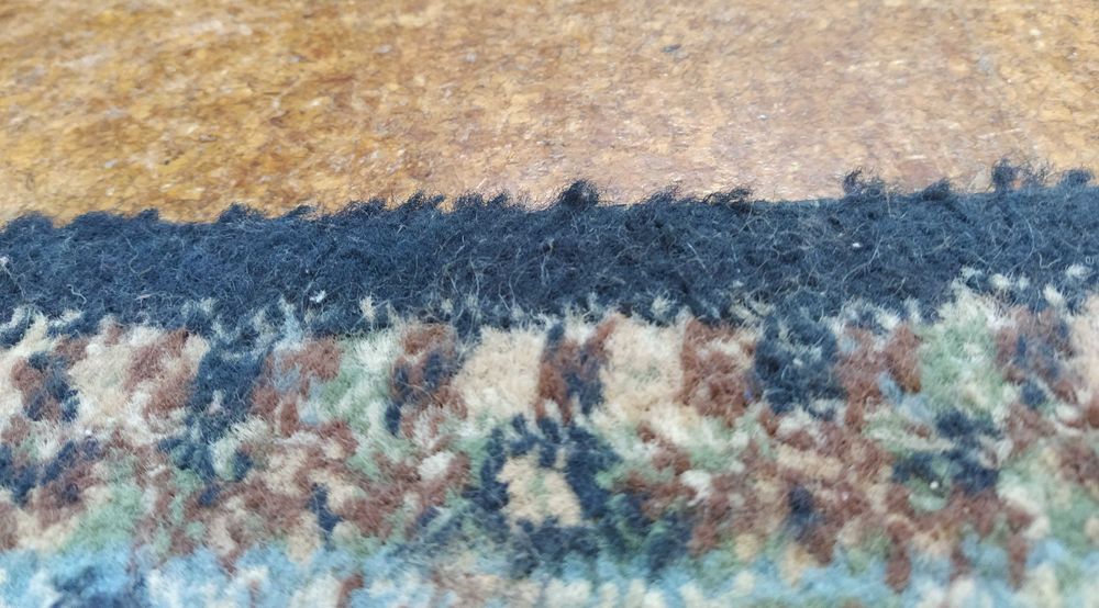 Tapete felpudo de lã