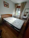 Cama de casal em madeira