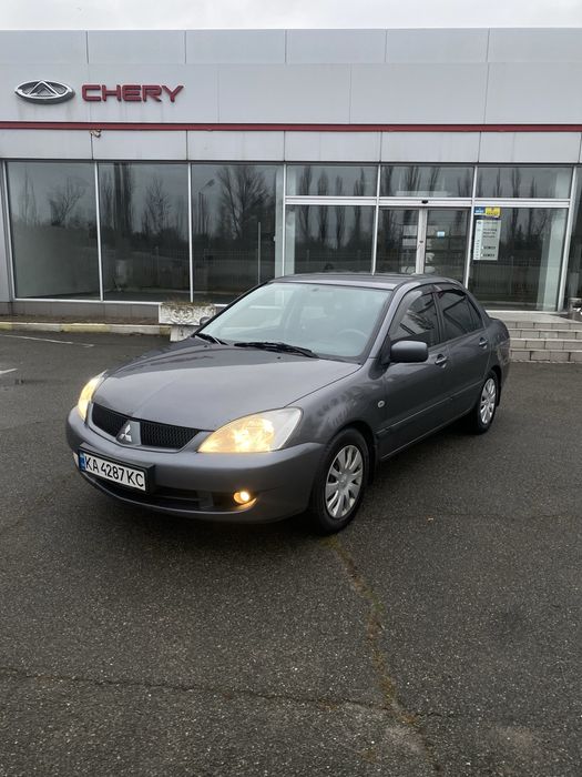 Mitsubishi Lancer 9 1.6 газ4 автомат