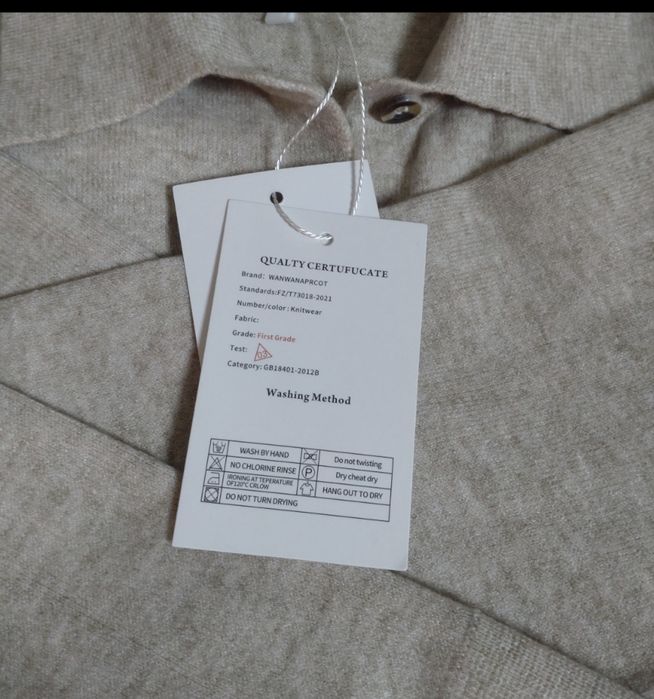 Поло з мериносовою вовною