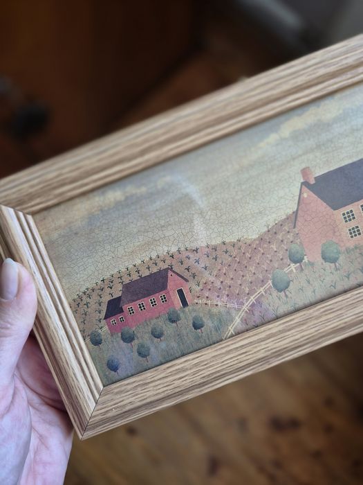 Rustykalny obrazek w ramce za szkłem wiejski krajobraz domy na wsi