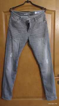 Spodnie damskie, jeans z przetarciami rozmiar 42