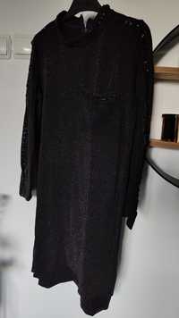 Czarna sukienka dłuższy tył Cekiny na rękawach M