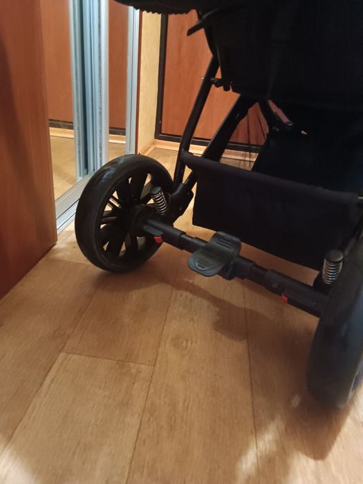 Дитяча універсальна прогулянкова коляска  Riko Nuno 03 Scarlet