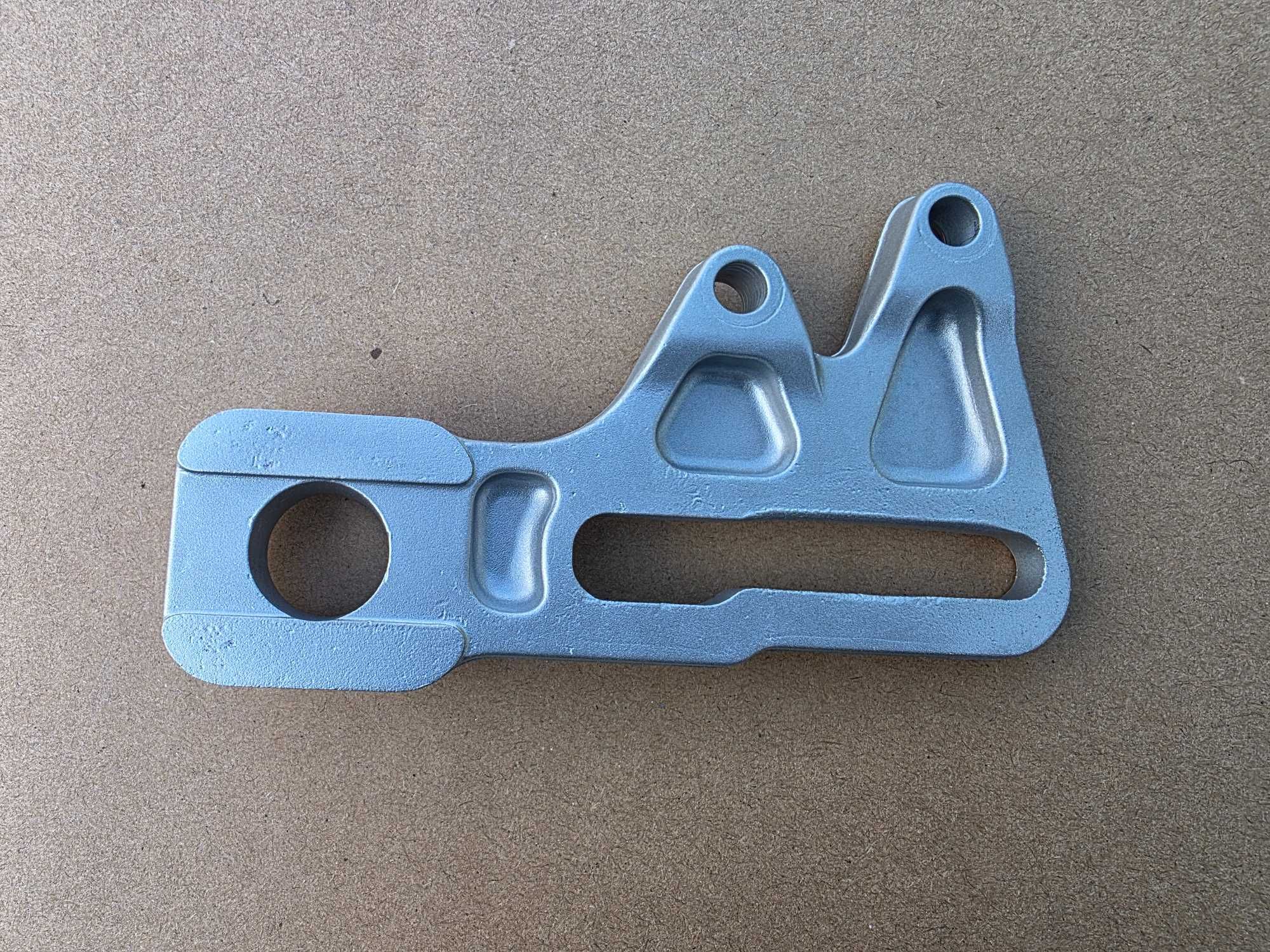 Adapter zacisku jarzmo tył tylnego KTM sx 85 r. 03-10 OEM