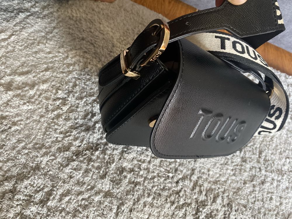 Bolsa da “Tous,”como nova