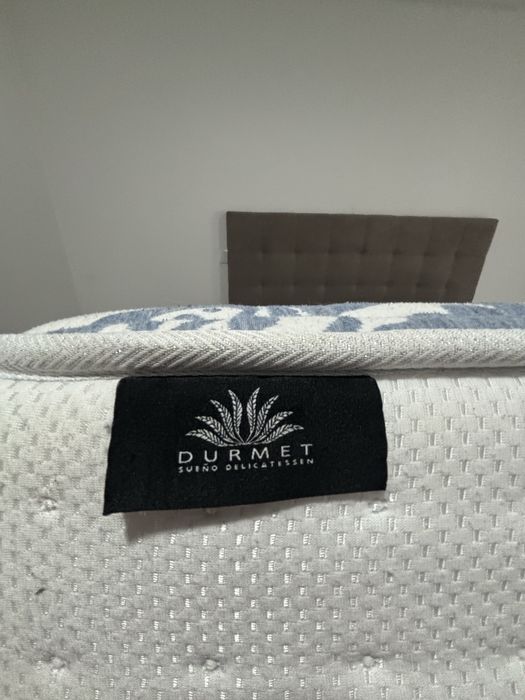 Cama de casal com arrumação