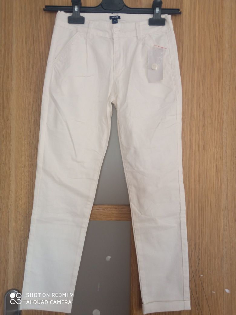 Nowe waflowe spodnie dla dziewczynki, rozm 126-131cm