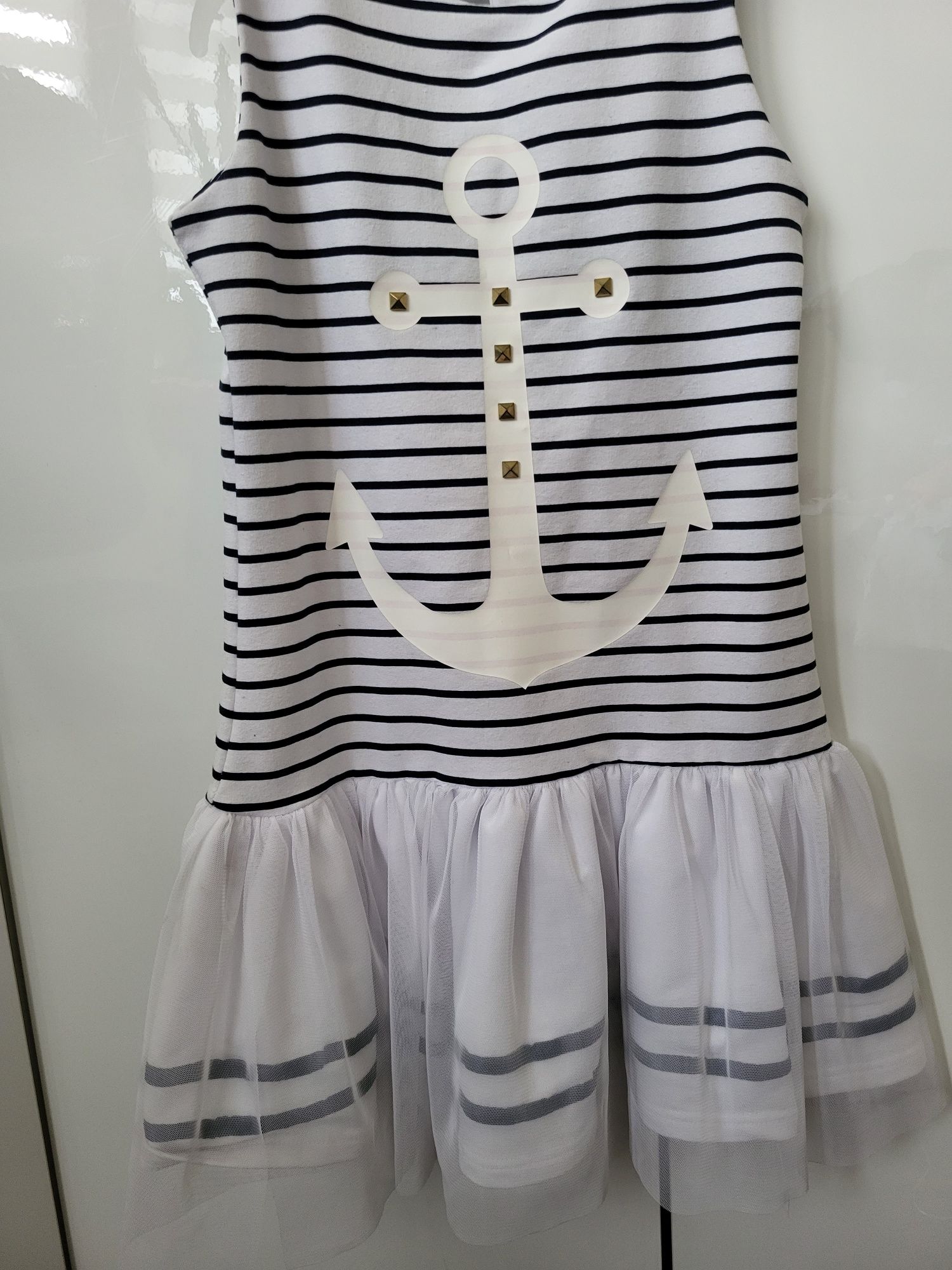 Śliczna sukienka dla dziewczynki motyw morski 134 140