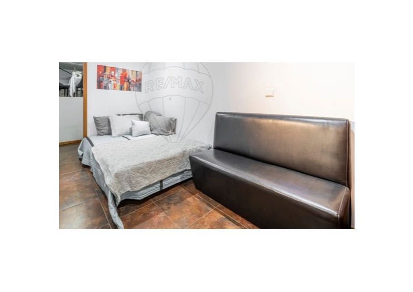 Sofa cama com cobertura