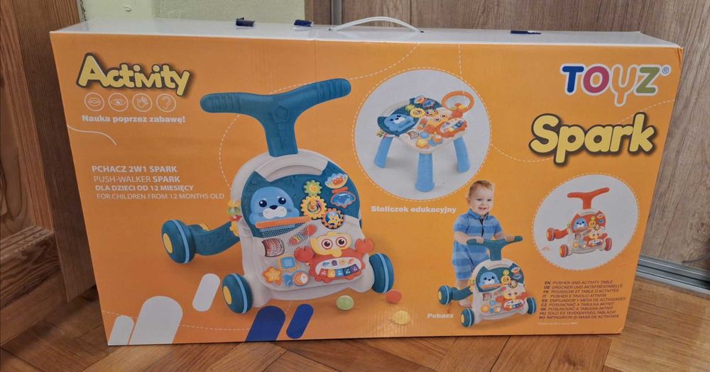 Pchacz, jeździk, chodzik, stolik edukacyjny Spark Toyz