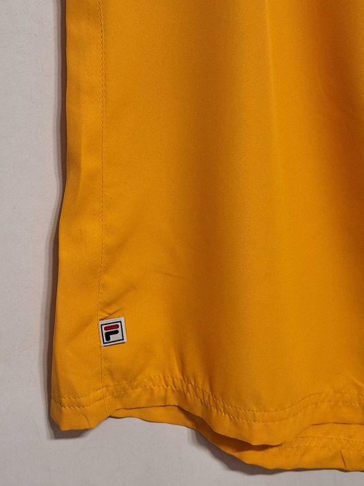 Нові жовті шорти Fila