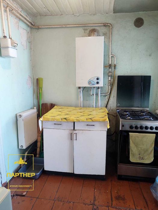 Продам  окрему  частину   будинку  у  нагірній частині Кременчука