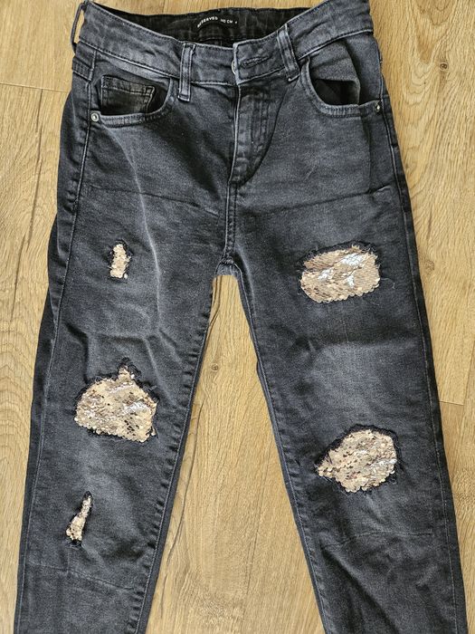 Spodnie jeansy Reserved rozmiar 140 cm.
