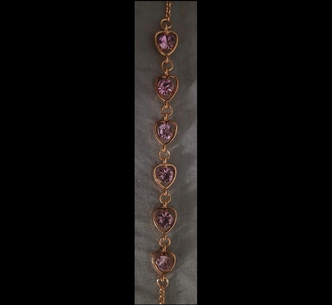 Pulseira dourada e roxa