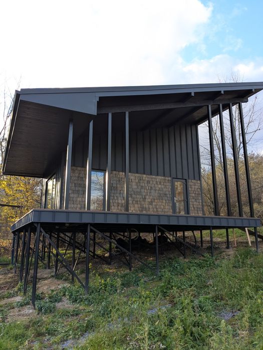 Конструктивний будівельний план каркасного будинку з терасою