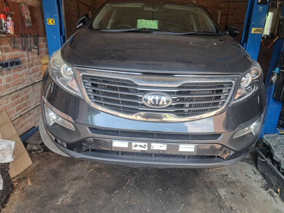 Kia Sportage 3 10-14 бампер передній в зборі Колір кузова 1K - BLACK