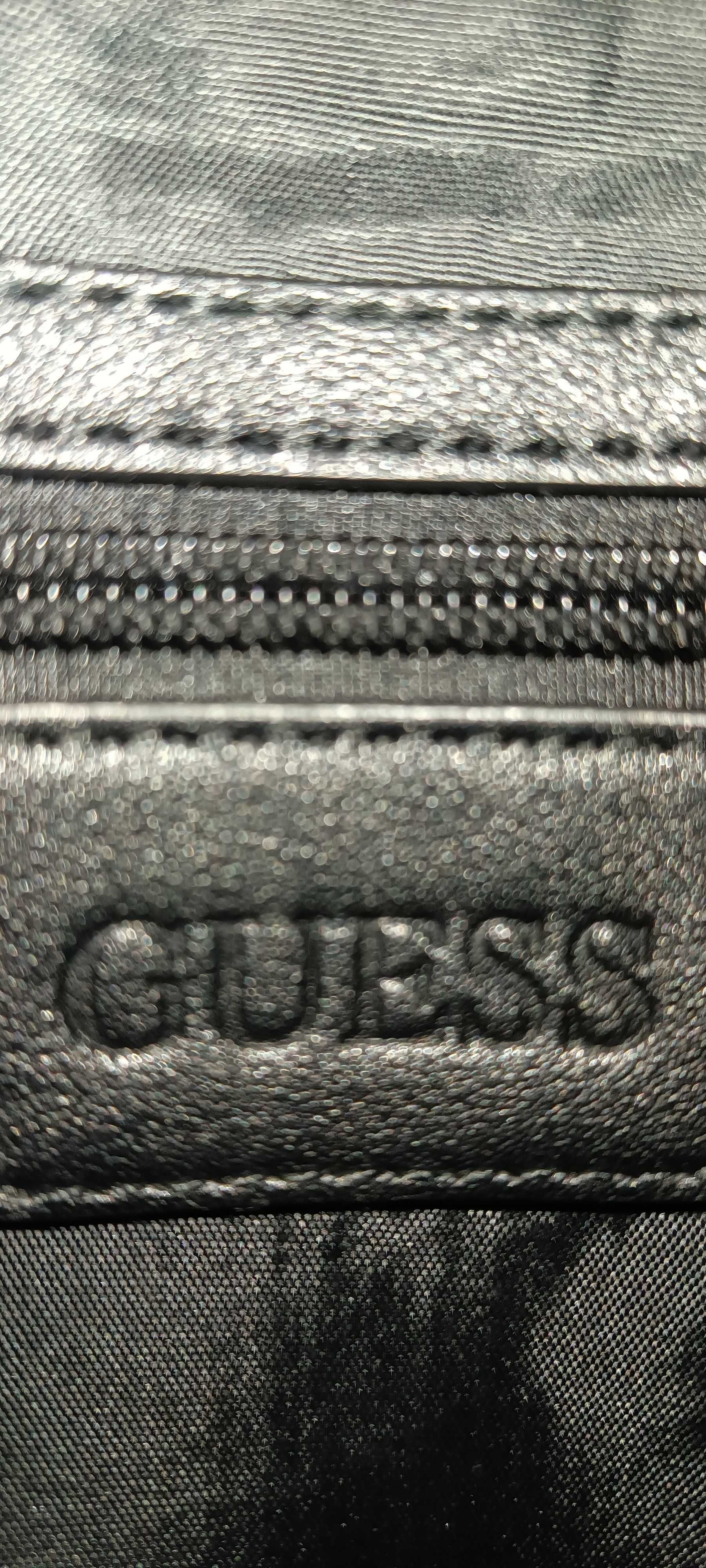 Saszetka GUESS 23,5 x 19,5 cm czarna kod: hmnnas p1805 męska torebka