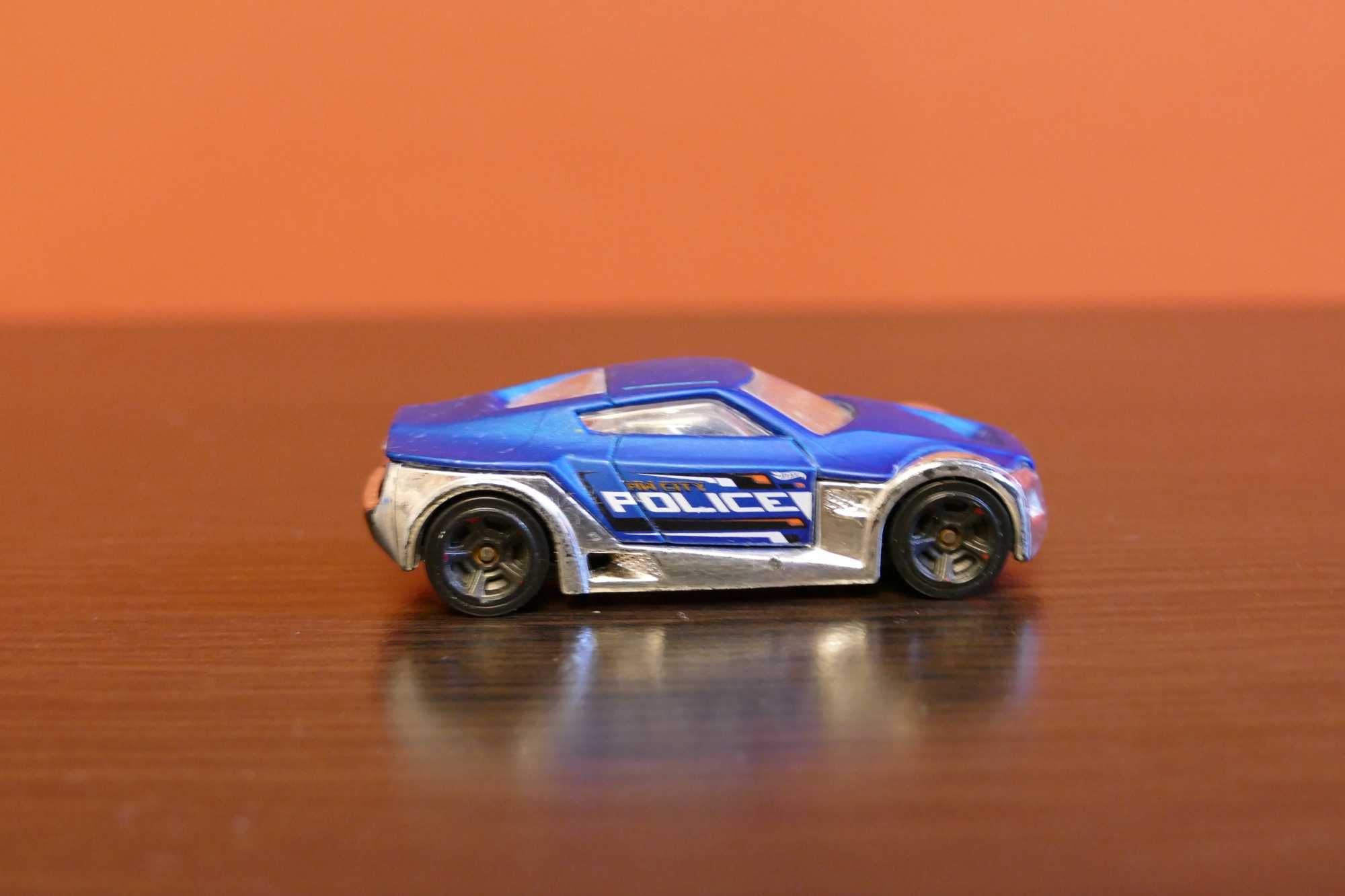 Hot Wheels autko "Resorak" Symbolic Metro Police