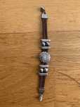 Pulseira de couro e prata