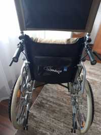 Wózek inwalidzki aluminiowy stabilizujacy plecy i głowę.