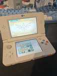 1. Przerobione New Nintendo 3DS + kabelek do ładowania
